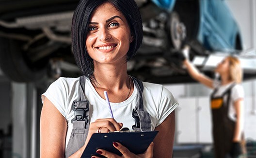car repair woman with checklist
